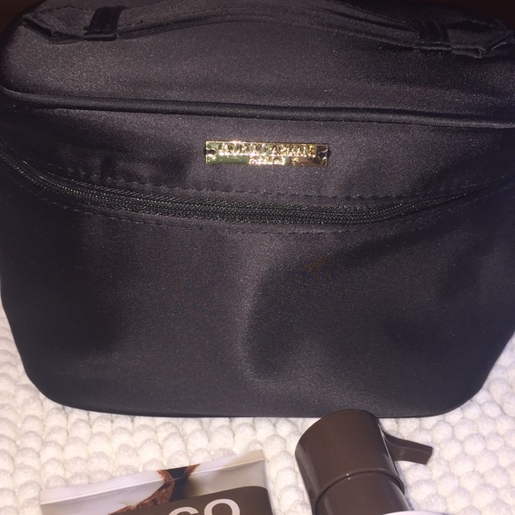 Giorgio Armani Accessories - Giorgio Armani travel bag with goodies